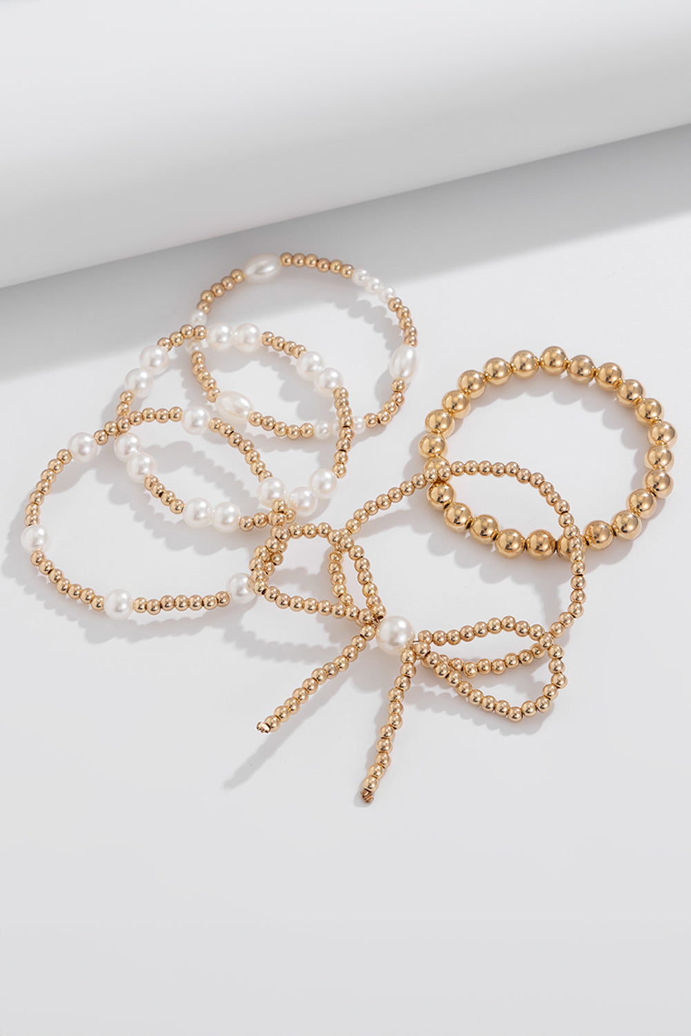 Gold Bow Knot Pearl Beaded Multi Layered Bracelet Set - HieuLuxe